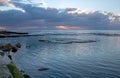 Sunrise rays over Dale Brook Tide Pool in Cape Town South Africa SA