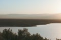 Sunrise over the Dead Sea on a foggy day. A view from Israel To Jordan Mountains. Royalty Free Stock Photo