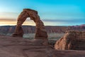 Sunrise over Delicate Arch in the Arches National Park Royalty Free Stock Photo