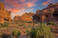 Sunrise over the Double Arch in the Windows Section of Arches National Park Royalty Free Stock Photo