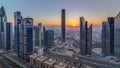 Sunrise over Dubai skyline in the morning, aerial top view to downtown city center landmarks timelapse. Royalty Free Stock Photo