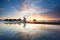 Sunrise over Dutch windmill and river Royalty Free Stock Photo