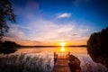 Sunrise over the fishing pier at the lake in Finland Royalty Free Stock Photo