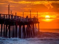 Sunrise over fishing pier at North Carolina Outer Banks Royalty Free Stock Photo