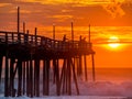 Sunrise over fishing pier at North Carolina Outer Banks Royalty Free Stock Photo