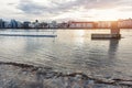 Sunrise over Flooded riverside Magdeburg pier Submerged embankment promenade Background. Cobblestone pavement road