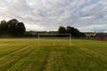 Sunrise over a football pitch