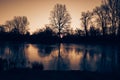 Sunrise over a frozen lake in the municipality of Deurne.