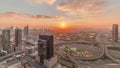 Sunrise over highway junction near media city and al barsha heights district area timelapse from Dubai marina. Royalty Free Stock Photo