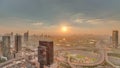 Sunrise over highway junction near media city and al barsha heights district area timelapse from Dubai marina. Royalty Free Stock Photo