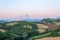 Sunrise over the hills of the village of Civitalba and Arcevia and Arcevia in Ancona in the Marche Italy Royalty Free Stock Photo