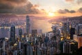 Sunrise over Hong Kong Victoria Harbor from Victoria Peak with Hong Kong and Kowloon below. Asian tourism, modern city life, or