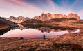 Sunrise over Lac Long with Massif des cerces reflection on the lake in Claree valley at French Alps, France Royalty Free Stock Photo