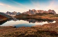 Sunrise over Lac Long with Massif des cerces reflection on the lake in Claree valley at French Alps, France Royalty Free Stock Photo