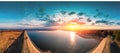 Sunrise over the lake in early spring. Horizontal panorama Royalty Free Stock Photo