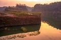 Sunrise over the lake with trees at Ranu Manduro, Mojokerto, Indonesia.