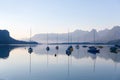 Sunrise over the lake Wolfgangsee with the sailboats parked on the waterfront Royalty Free Stock Photo