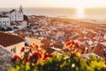 Sunrise Over Lisbon Old Town Alfama - Portugal. Lisbon Golden Hour Skyline. Balcony View on Alfama Old Town of Lisbon and Tagus Royalty Free Stock Photo