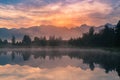 Sunrise over Matheson lake with Fox mountain reflection, New Zealand Royalty Free Stock Photo