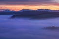 Sunrise Over Misty Landscape. Scenic View Of Foggy Morning Sky With Rising Sun Above Misty Forest. Middle Summer Nature Of Europe. Royalty Free Stock Photo