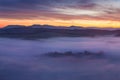 Sunrise Over Misty Landscape. Scenic View Of Foggy Morning Sky With Rising Sun Above Misty Forest. Middle Summer Nature Of Europe. Royalty Free Stock Photo