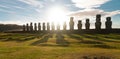 Sunrise over Moai stone sculptures at Ahu Tongariki, Easter island, Chile.