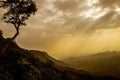 Sunrise over the mountain landscape, A beautiful sun rays with clouds Royalty Free Stock Photo