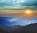 Sunrise over a mountain valley Royalty Free Stock Photo