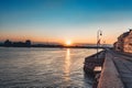 Sunrise over Neva river on Palace embankment. Early morning in Saint-Petersburg. Russia