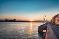 Sunrise over Neva river on Palace embankment. Early morning in Saint-Petersburg. Russia