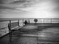 Sunrise over ocean. Empty wooden pier at colorful morning. Royalty Free Stock Photo