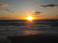 Sunrise over the ocean horizon Cancun Mexico beach sun sky clouds sunlight reflection travel tourism Royalty Free Stock Photo