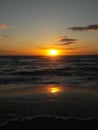 Sunrise over the ocean horizon Cancun Mexico beach sun sky clouds sunlight reflection travel tourism Royalty Free Stock Photo