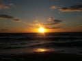 Sunrise over the ocean horizon Cancun Mexico beach sun sky clouds sunlight reflection travel tourism Royalty Free Stock Photo