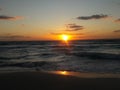 Sunrise over the ocean horizon Cancun Mexico beach sun sky clouds sunlight reflection travel tourism Royalty Free Stock Photo