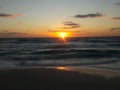 Sunrise over the ocean horizon Cancun Mexico beach sun sky clouds sunlight reflection travel tourism Royalty Free Stock Photo