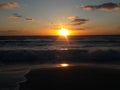 Sunrise over the ocean horizon Cancun Mexico beach sun sky clouds sunlight reflection travel tourism Royalty Free Stock Photo