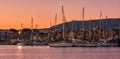 Sunrise over Old Venetian port and harbour of Chania, Crete, Greece. Sailing boats, pier, Old Venetian shipyards and Royalty Free Stock Photo