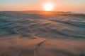 Sunrise over pristine sand dunes. Royalty Free Stock Photo