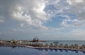 Sunrise over Puerto Juarez Cancun Mexico beachside pool and fishing boats / trawler and docks and pier and jetty and seawall