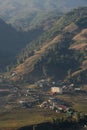 Sunrise over rice terrace with small village Royalty Free Stock Photo