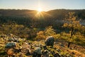 Sunrise over river Litava valley near ruins of Cabrad castle during autumn sunrise with fall coloured trees