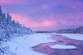 Sunrise over river rapids in a winter, Finnish Lapland Royalty Free Stock Photo