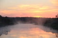 . Sunrise over the river. Reflection Royalty Free Stock Photo