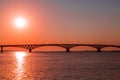 Sunrise over a road bridge across the Volga river between the cities of Saratov and Engels, Russia Royalty Free Stock Photo