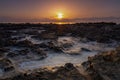 Sunrise over the rocky coast of the Mediterranean Sea Royalty Free Stock Photo