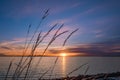 Sunrise over the sea and beautiful cloudscape. Colorful ocean beach sunrise with deep blue sky and sunrays Sunset, beach Royalty Free Stock Photo