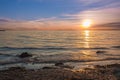 Sunrise over the sea and beautiful cloudscape. Colorful ocean beach sunrise with deep blue sky and sunrays Sunset, beach Royalty Free Stock Photo