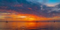 Sunrise over the sea and beautiful cloudscape. Colorful ocean beach sunset. Royalty Free Stock Photo