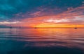 Sunrise over the sea and beautiful cloudscape. Colorful ocean beach sunset. Royalty Free Stock Photo